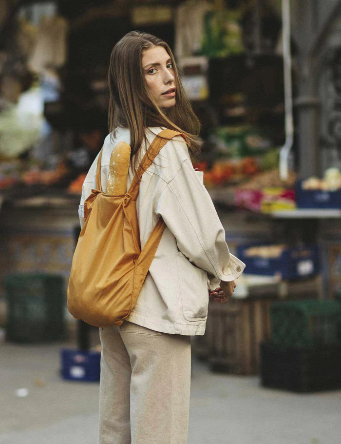 Bolsa Mochila plegable Notabag MUSTARD